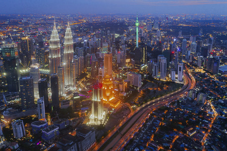 Kuala lumpur city skyline and its surroundings aerial view at sunset malaysia Stock Photo