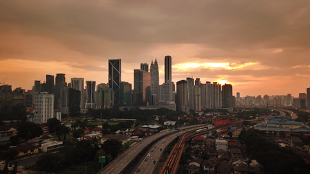 View of kuala lumpur skyline during sunrise drone shot