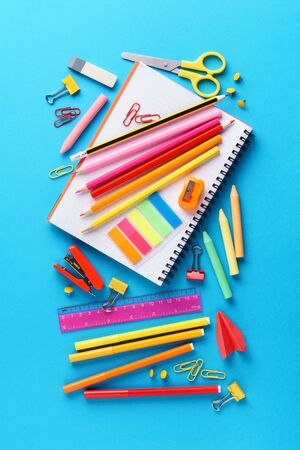 Set of various colorful school stationery and supplies on blue background Stock Photo