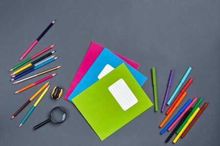 Flat lay photo of workspace desk with school accessories or office supplies