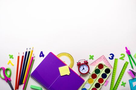 School supplies on light background top view copy space