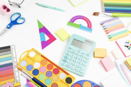 School supplies set of colorful school accessories isolated on the white table