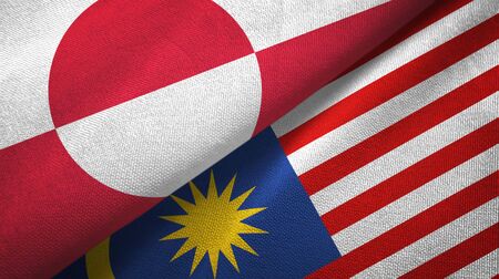 Greenland and malaysia flags together textile cloth fabric texture Stock Photo