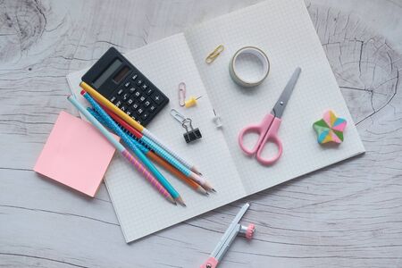 Top view of school suppliers on white background Stock Photo