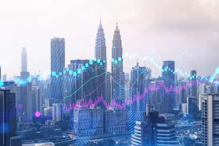 Forex and stock market chart hologram over panorama city view of kuala lumpur kl is the financial center in malaysia asia the concept of international trading double exposure Stock Photo