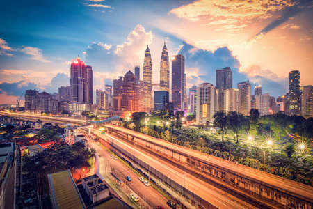 Cityscape of kuala lumpur city skyline at sunrise in malaysia Stock Photo