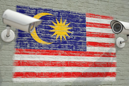 Surveillance cameras and wall with flag of malaysia modern security related 3d rendering