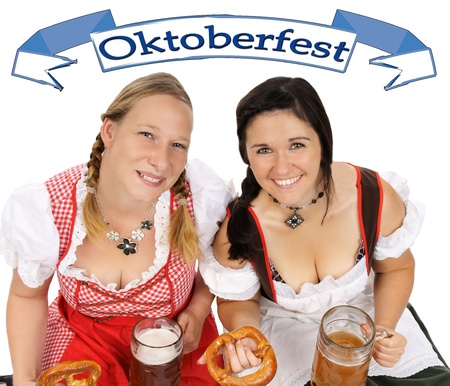 Two young pretty women in dirndl with beer mug Stock Photo