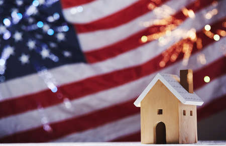 4th of july of independence day labor day usa flag on fabric texture house model with firework on flag background Stock Photo