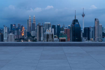 Panoramic kuala lumpur skyline view concrete observatory deck on rooftop night asian corporate and residential lifestyle financial city downtown real estate product display mockup empty roof