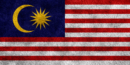 Malaysian flag on a textured background concept collage