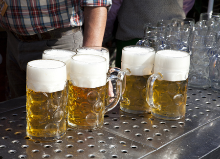 Several fresh beer at oktoberfest in munich