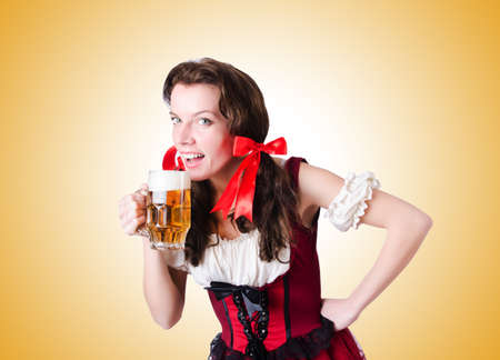 Bavarian girl with tray on white Stock Photo