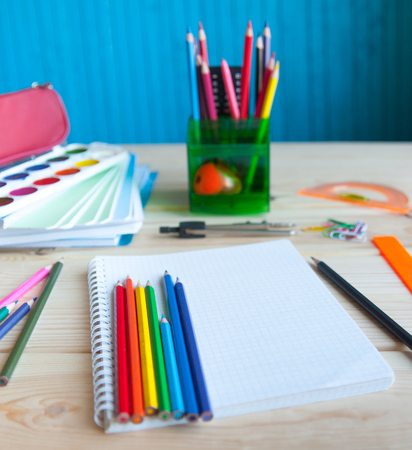 Many school supplies are a bunch on the table Stock Photo