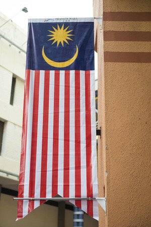 Malaysia flag hang on the building anthems Stock Photo