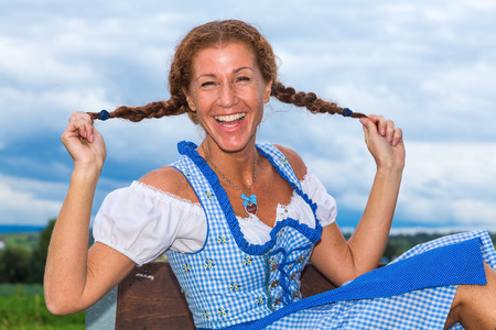 Woman in dress showing her hair style