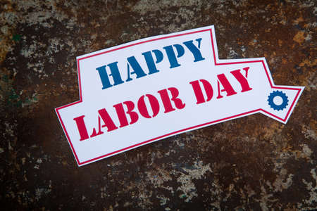 Labor day sign on the rusty background Stock Photo