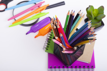 Childrens school and office supplies on the table selective focus and small depth of field