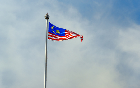 Malaysia national flag on blue sky background Stock Photo