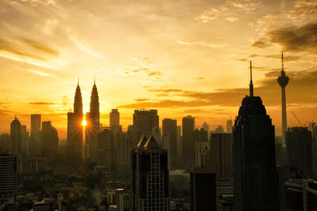 Silhouette shot of downtown kuala lumpur skyline at twilight in malaysia