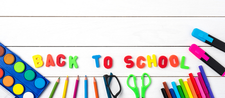 Back to school on white wooden table