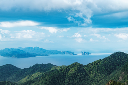 Panoramic view of blue sky sea and mountain seen from cable car viewpoint langkawi malaysia picturesque landscape with tropical forest beaches small islands in waters of strait of malacca Stock Photo