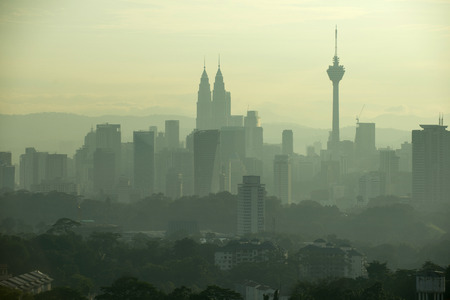 Kuala lumpur morning skyline view with fog